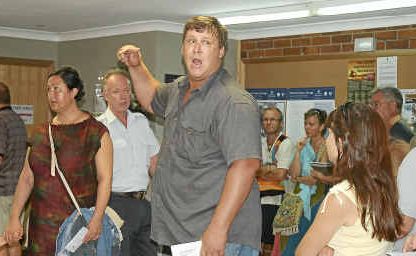 Angry Sydney couple Peter Poinkin and Konstanza Kulakowski leave the auction after their registration to bid was refused. Angry Sydney couple Peter Poinkin and Konstanza Kulakowski leave the auction after their registration to bid was refused.
